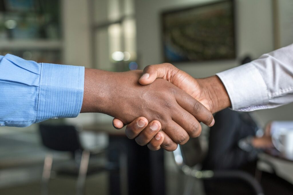 Handshake closing an ERPNext project agreement