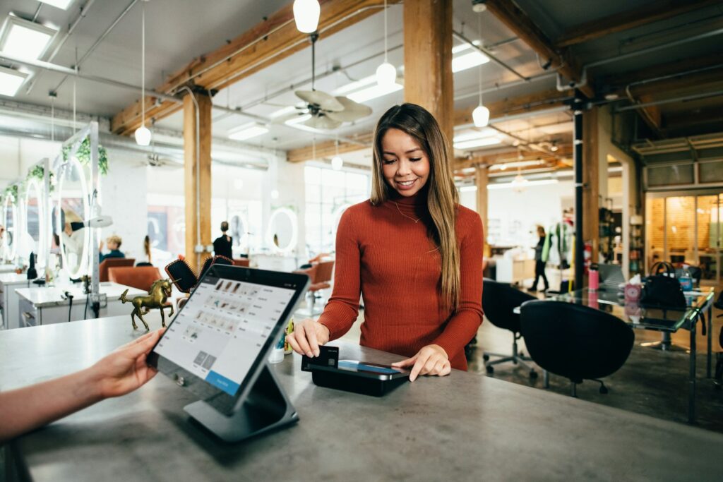 Customer paying at a card and mobile payment terminal